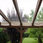 Terrassendach Leimholz mit Glasdach und Sonnenschutz